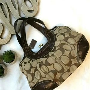 100 % AUTHENTIC "LIKE NEW"
Coach Ergo